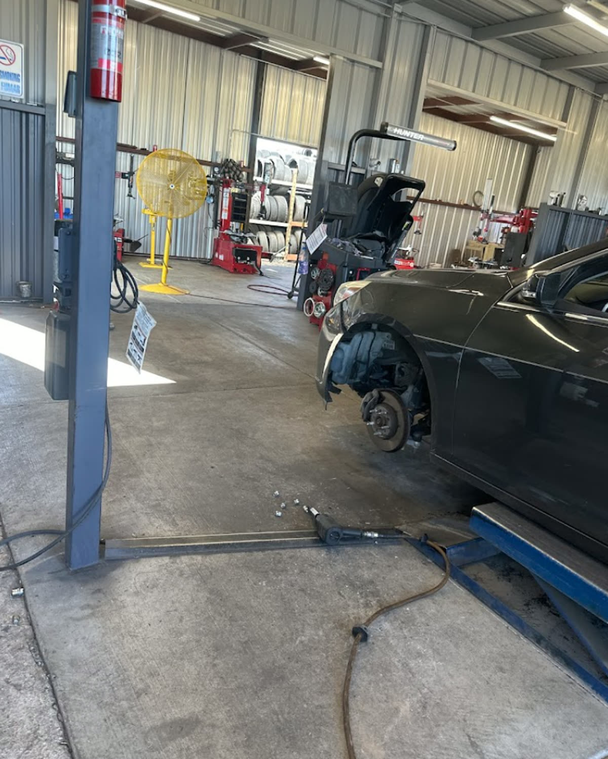 Service bay with mechanic working